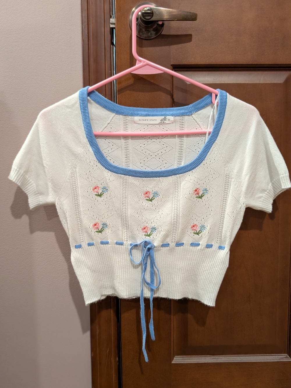 Altar'd State Cream Cropped Knit Top with Blue Trim and Pink Floral Embroidery